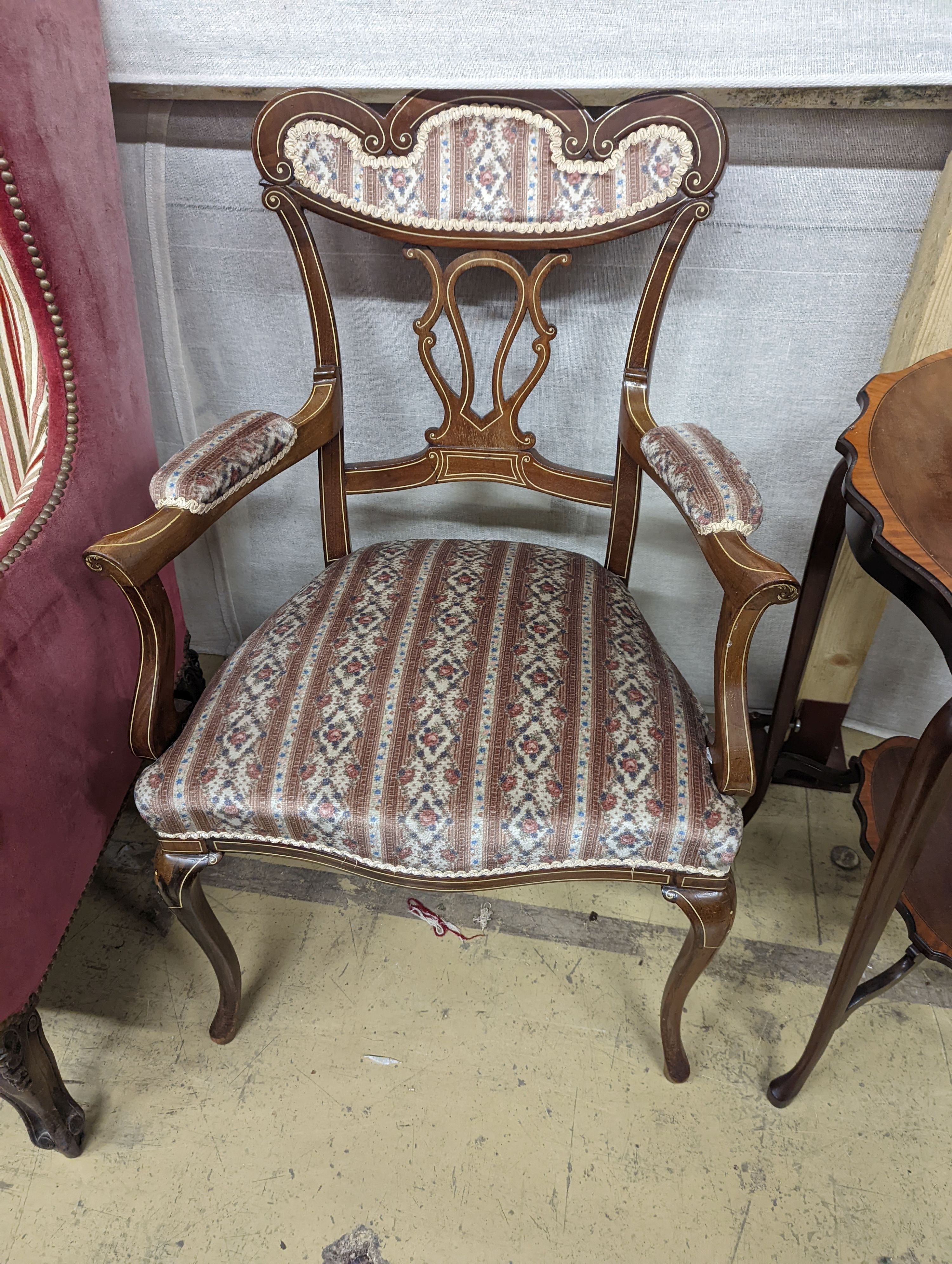 Three late Victorian bone inlaid mahogany chairs, two with arms, together with an Edwardian oval satinwood banded occasional table.